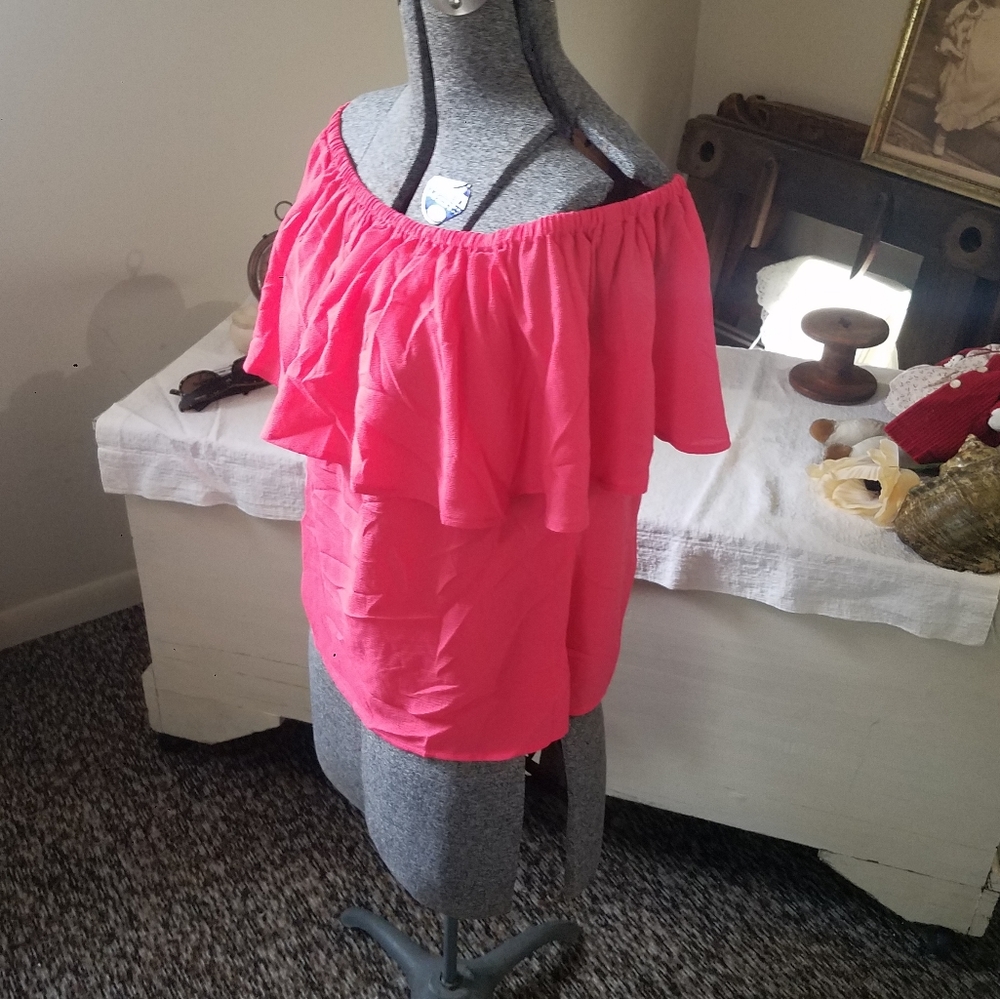 Coral off the shoulder ruffle blouse.
